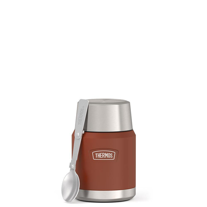 16 ounce Thermos Food Jar with stainless steel spoon, front view, spoon unfolded and leaning on the food jar, Saddle Brown.
