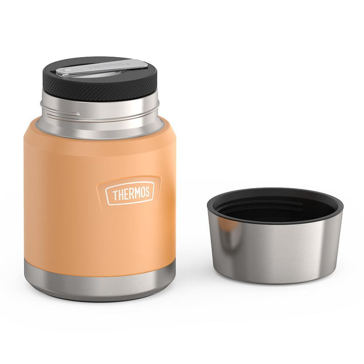 16 ounce Thermos Food Jar with stainless steel spoon, lid off and spoon folded inside of spoon holder, Melon Orange.

